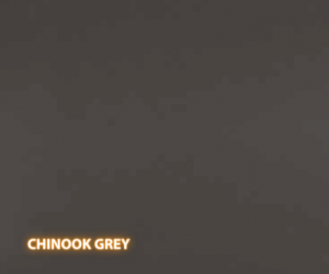 Chinook Grey Quartz - A slab of engineered stone, Quartz, featuring a dark & warm gray base with very tight stipples of black, gray and brown - Polished Finish