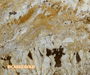 Picasso Gold Granite - A slab of natural stone, Granite, featuring a warm, light base with a patterned movement of greys, browns, whites, tans and golds - Polished Finish