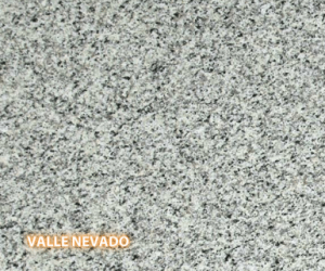 Valle Nevado Granite - A slab of natural stone, Granite, featuring a light & cool base with a fleck pattern of blacks, grays, whites, browns, greens, and blues - Polished Finish