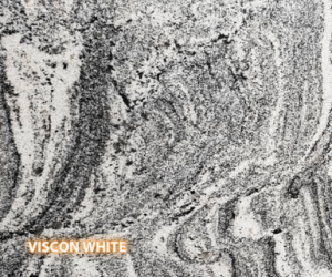 Viscon White Granite - A slab of natural stone, Granite, featuring a neutral, light base with striations of  grey and white - Polished Finish